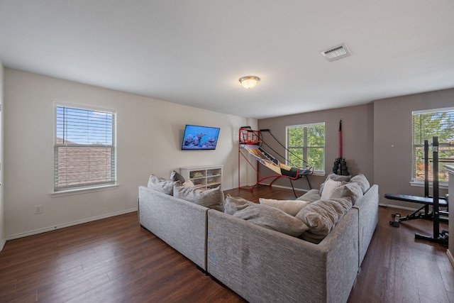808 Lonesome Lilly Way, Pflugerville, TX 78660 - living room with dark wood-type flooring and baseboards