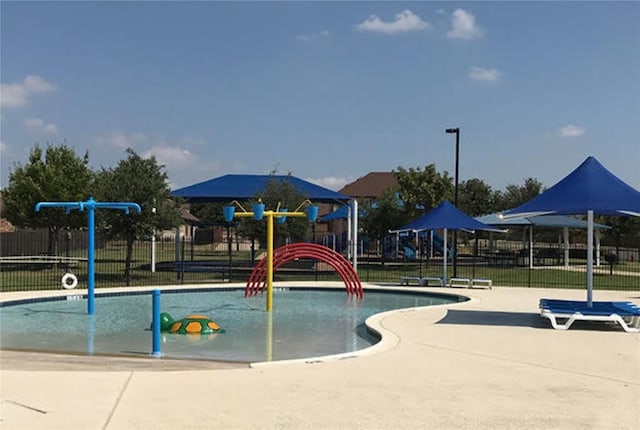 808 Lonesome Lilly Way, Pflugerville, TX 78660 - communal playground with a water play area