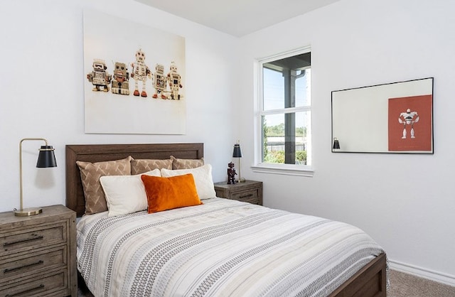 1700 Lorant Ln, Pflugerville, TX 78660 - carpeted bedroom featuring baseboards