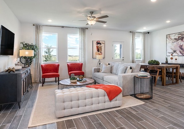 1700 Lorant Ln, Pflugerville, TX 78660 - living area featuring wood finished floors, ceiling fan, and recessed lighting