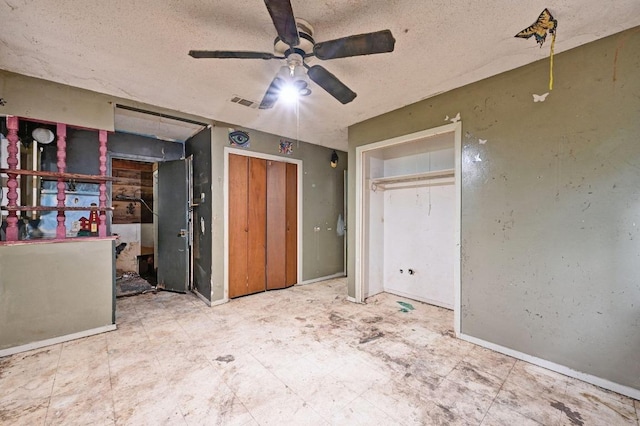 10410 Margra Ln, Austin, TX 78748 - unfurnished bedroom featuring a textured ceiling