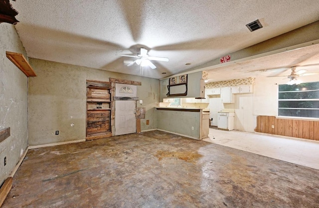 10410 Margra Ln, Austin, TX 78748 - unfurnished living room with a ceiling fan and a textured ceiling