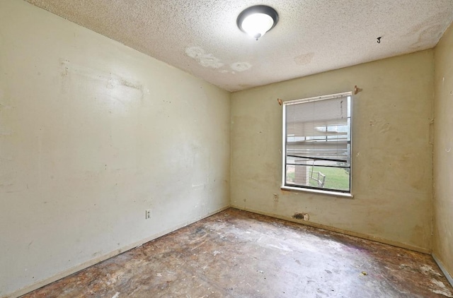 10410 Margra Ln, Austin, TX 78748 - unfurnished room featuring a textured ceiling