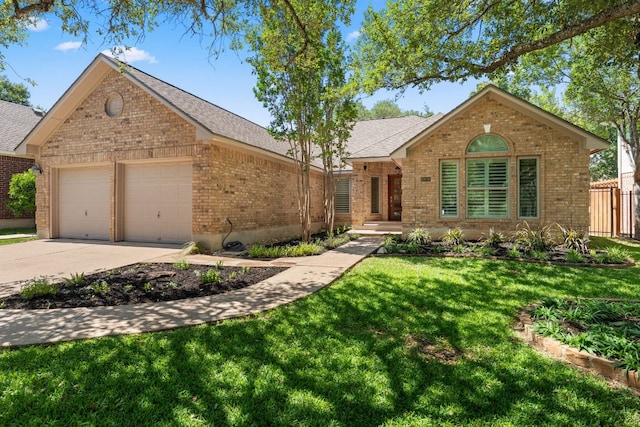 10808 Redmond Rd, Austin, TX 78739 - single story home with brick siding, a garage, driveway, and a shingled roof