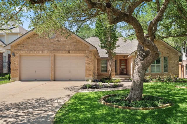 10808 Redmond Rd, Austin, TX 78739 - view of front of home featuring brick siding, a garage, concrete driveway, a front lawn, and a shingled roof