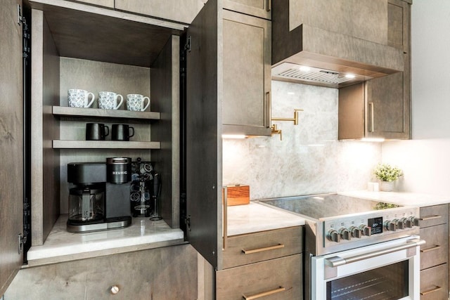 3 Stillmeadow Ct, The Hills, TX 78738 - kitchen featuring high end white range oven, custom range hood, light countertops, and tasteful backsplash