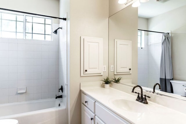 3 Stillmeadow Ct, The Hills, TX 78738 - full bathroom with healthy amount of natural light, vanity, and shower / tub combo with curtain