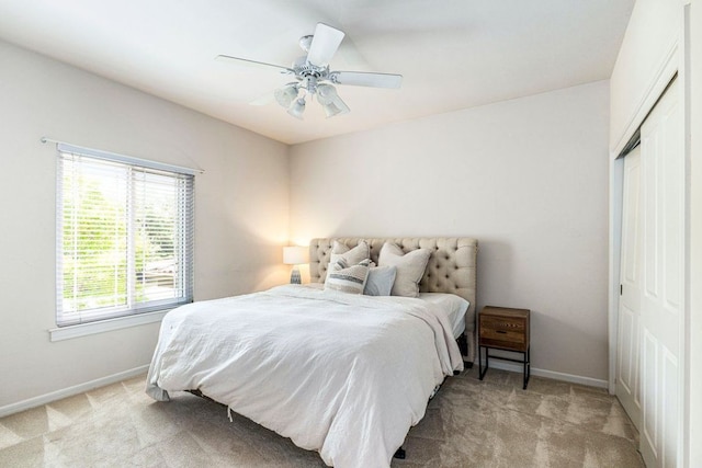 3 Stillmeadow Ct, The Hills, TX 78738 - bedroom with light colored carpet, a closet, and a ceiling fan