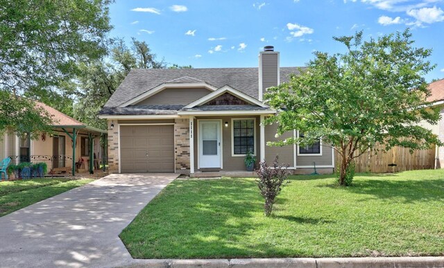 1111 Fairlawn Cv, Round Rock, TX 78664 - view of front facade with a garage, driveway, a chimney, and roof with shingles