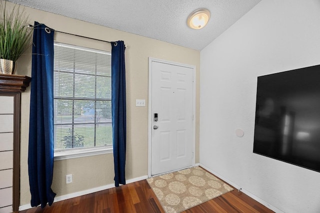 1111 Fairlawn Cv, Round Rock, TX 78664 - foyer with wood finished floors and a textured ceiling