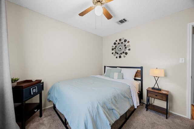 1111 Fairlawn Cv, Round Rock, TX 78664 - carpeted bedroom featuring ceiling fan and baseboards
