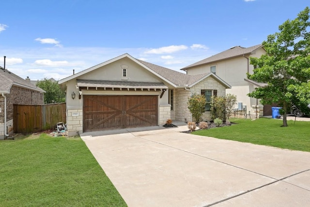 15617 Cinca Terra Dr, Bee Cave, TX 78738 - view of front facade with stone siding, a garage, and stucco siding