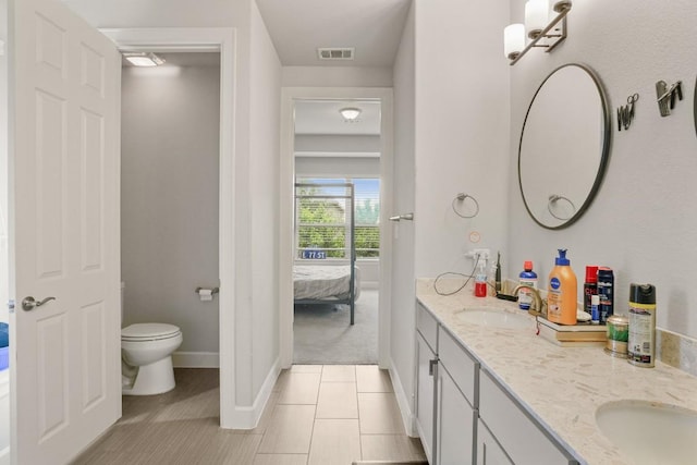 15617 Cinca Terra Dr, Bee Cave, TX 78738 - full bath with ensuite bathroom, double vanity, and tile patterned flooring