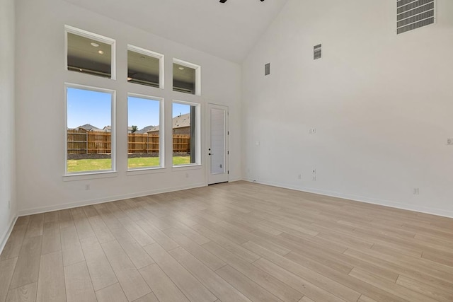 418 Darley Oak Dr, Dripping Springs, TX 78620 - empty room featuring high vaulted ceiling, light wood-style floors, and ceiling fan