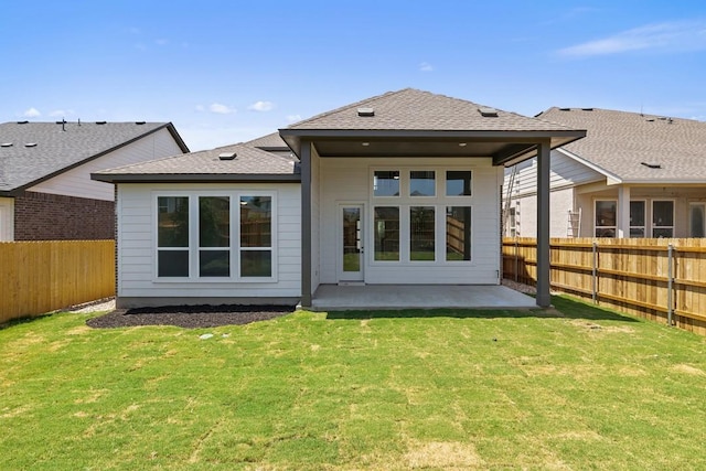 418 Darley Oak Dr, Dripping Springs, TX 78620 - rear view of house featuring a fenced backyard, a patio area, and roof with shingles