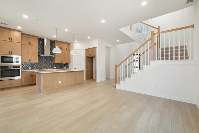418 Darley Oak Dr, Dripping Springs, TX 78620 - kitchen featuring wall chimney exhaust hood, stainless steel appliances, tasteful backsplash, light countertops, and light wood finished floors