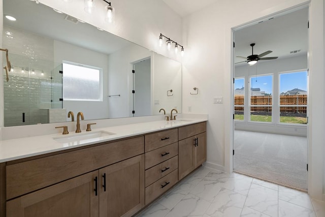 418 Darley Oak Dr, Dripping Springs, TX 78620 - bathroom featuring double vanity, healthy amount of natural light, a shower stall, and marble finish flooring