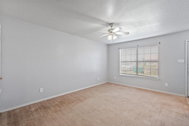 204 Meadowview Ln, Gatesville, TX 76528 - empty room with a ceiling fan, carpet, and a textured ceiling
