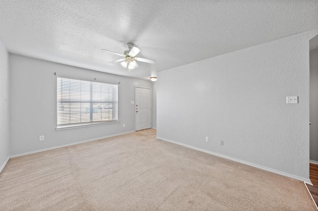 204 Meadowview Ln, Gatesville, TX 76528 - spare room featuring a ceiling fan, a textured ceiling, and light carpet