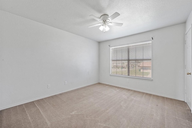 204 Meadowview Ln, Gatesville, TX 76528 - spare room featuring a ceiling fan, carpet floors, and a textured ceiling