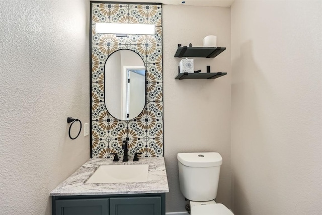 17729 Golden Valley Dr, Manor, TX 78653 - half bath featuring vanity and a textured wall