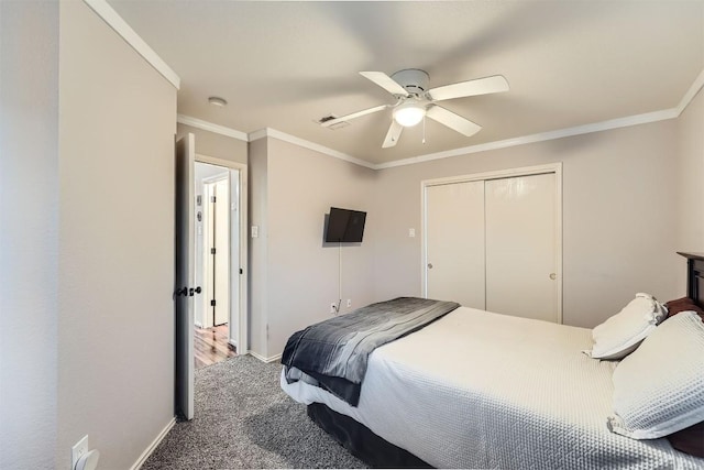 17729 Golden Valley Dr, Manor, TX 78653 - carpeted bedroom featuring ornamental molding, a closet, and ceiling fan