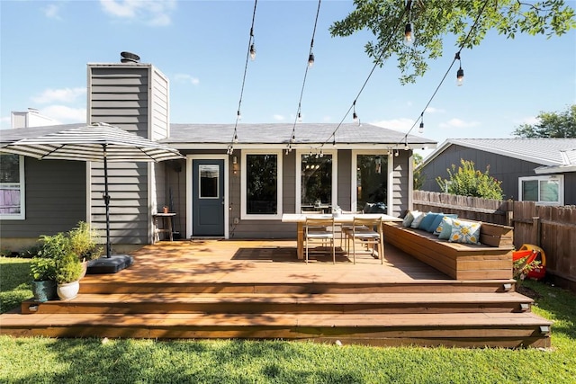 7619 Scenic Brook Dr, Austin, TX 78736 - rear view of house featuring a chimney, an outdoor living space, and a deck