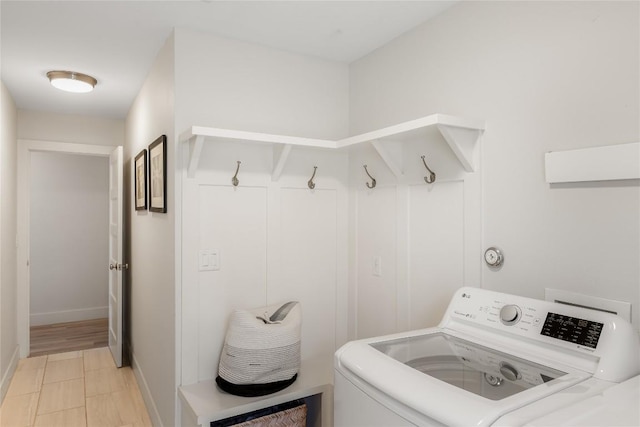 7619 Scenic Brook Dr, Austin, TX 78736 - laundry area featuring washer / clothes dryer and baseboards