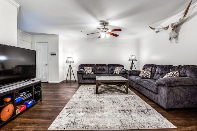 501 W 26th St Unit 105, Austin, TX 78705 - living area with ornamental molding, dark wood finished floors, and ceiling fan
