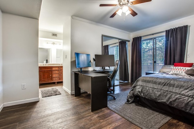 501 W 26th St Unit 105, Austin, TX 78705 - bedroom featuring ornamental molding, dark wood finished floors, a desk, ensuite bathroom, and ceiling fan