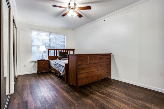 501 W 26th St Unit 105, Austin, TX 78705 - bedroom with dark wood finished floors, crown molding, and a ceiling fan