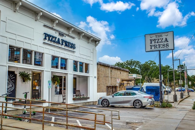 501 W 26th St Unit 105, Austin, TX 78705 - view of building exterior featuring uncovered parking
