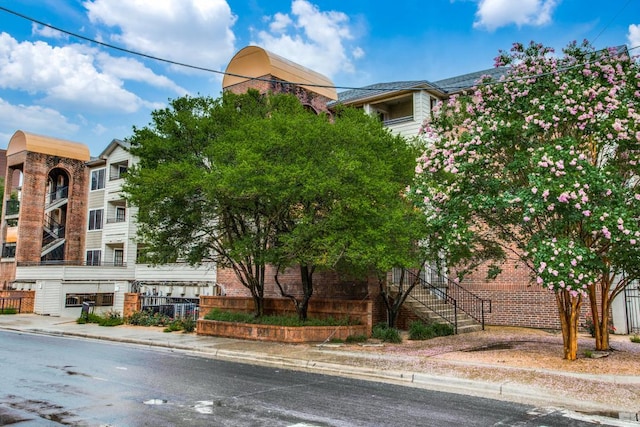 501 W 26th St Unit 105, Austin, TX 78705 - view of property featuring stairway