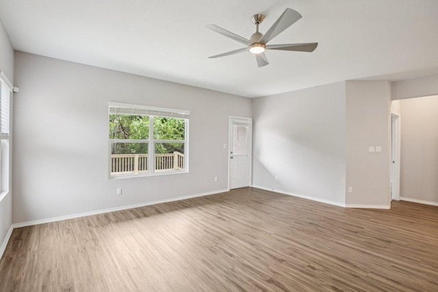1524 Brueggerhoff Rd, Leander, TX 78641 - spare room with wood finished floors and a ceiling fan