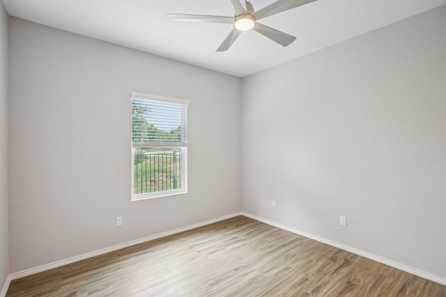1524 Brueggerhoff Rd, Leander, TX 78641 - unfurnished room with wood finished floors and a ceiling fan
