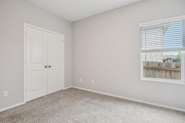 1524 Brueggerhoff Rd, Leander, TX 78641 - unfurnished bedroom with carpet floors and a closet