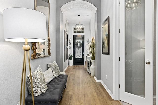 169 Fort Cobb Way, Georgetown, TX 78628 - foyer with a chandelier and wood finished floors