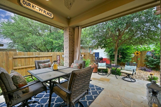 169 Fort Cobb Way, Georgetown, TX 78628 - fenced backyard with outdoor dining area and a patio area