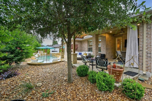 169 Fort Cobb Way, Georgetown, TX 78628 - view of yard with a patio area, outdoor lounge area, and an outdoor pool