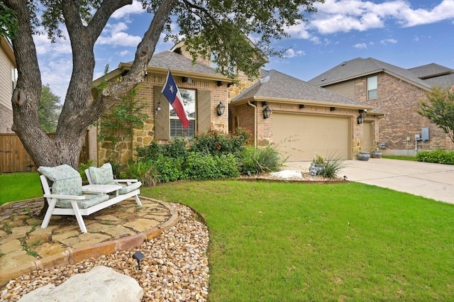 169 Fort Cobb Way, Georgetown, TX 78628 - view of front facade with brick siding, an attached garage, a shingled roof, and driveway