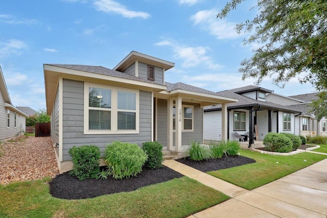 2424 Pecan Island Dr, Leander, TX 78641 - bungalow-style house with a porch