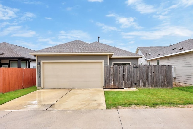 2424 Pecan Island Dr, Leander, TX 78641 - view of front of property featuring driveway, an attached garage, and a shingled roof