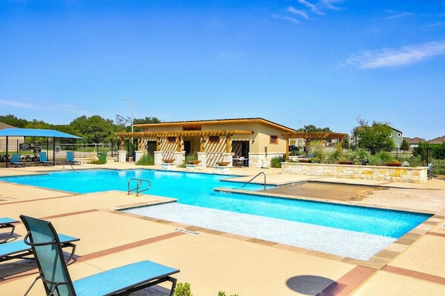2424 Pecan Island Dr, Leander, TX 78641 - community pool featuring a patio area and a pergola