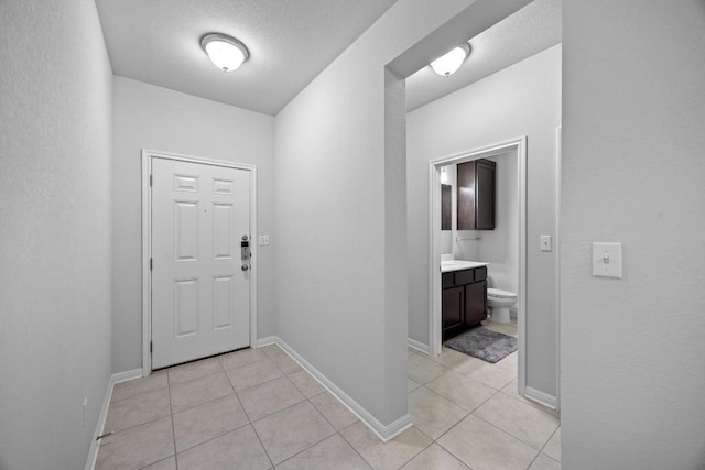2424 Pecan Island Dr, Leander, TX 78641 - entrance foyer featuring light tile patterned floors