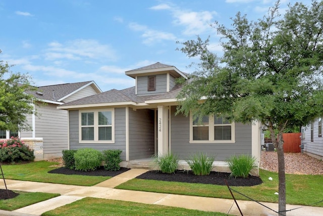2424 Pecan Island Dr, Leander, TX 78641 - bungalow-style home featuring a shingled roof