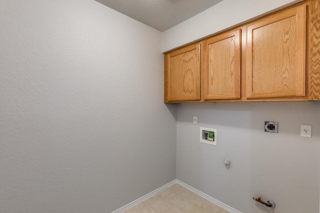 15737 Cadoz Dr, Austin, TX 78728 - washroom featuring gas dryer hookup, hookup for a washing machine, electric dryer hookup, cabinet space, and light carpet