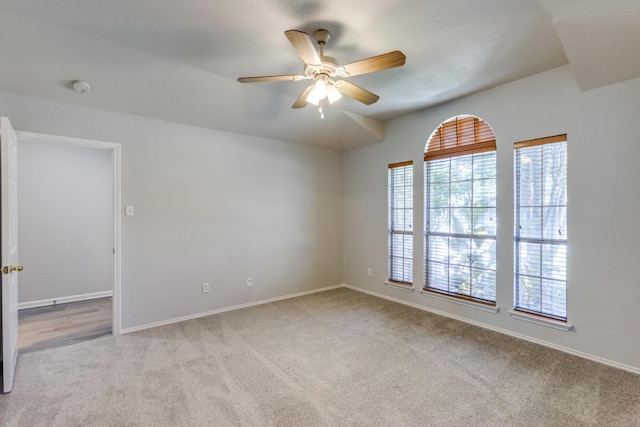 15737 Cadoz Dr, Austin, TX 78728 - carpeted spare room featuring a ceiling fan and a smoke detector