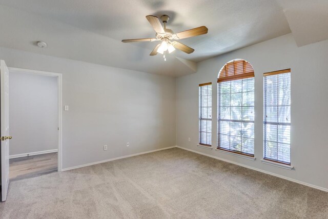 15737 Cadoz Dr, Austin, TX 78728 - carpeted empty room featuring a ceiling fan and a smoke detector