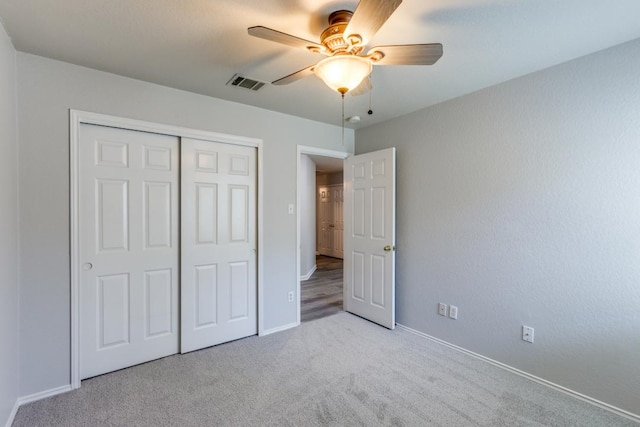 15737 Cadoz Dr, Austin, TX 78728 - unfurnished bedroom with light carpet, a closet, and a ceiling fan