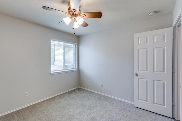 15737 Cadoz Dr, Austin, TX 78728 - carpeted empty room with a smoke detector and ceiling fan